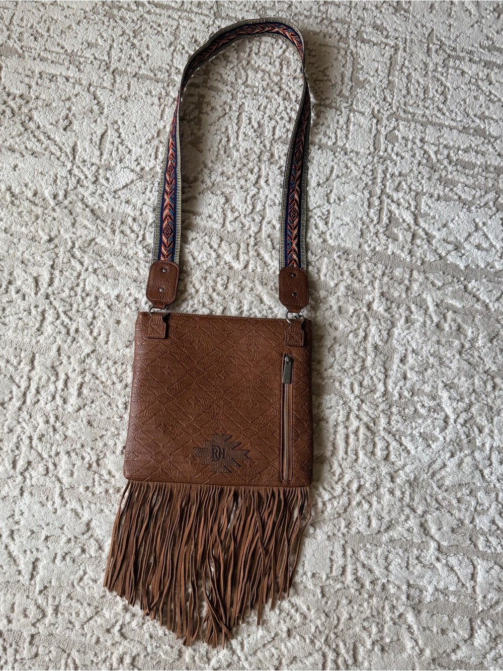 Red Dirt Hat Co Brown Leather Fringe Crossbody Bag with Patterned Strap - Emboss